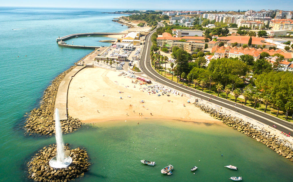 Indulge in the captivating beauty of Praia Velha, a tranquil beach along Portugal's Linha coastline, where nature's splendor and serene ambiance create an unforgettable coastal retreat.