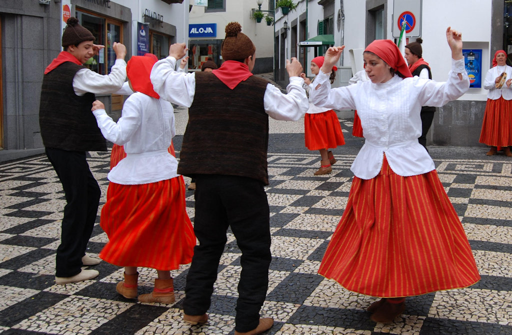 Immerse yourself in the lively rhythms and colorful traditions of the Chula dance, a cherished Portuguese folk dance that embodies community spirit and cultural heritage.