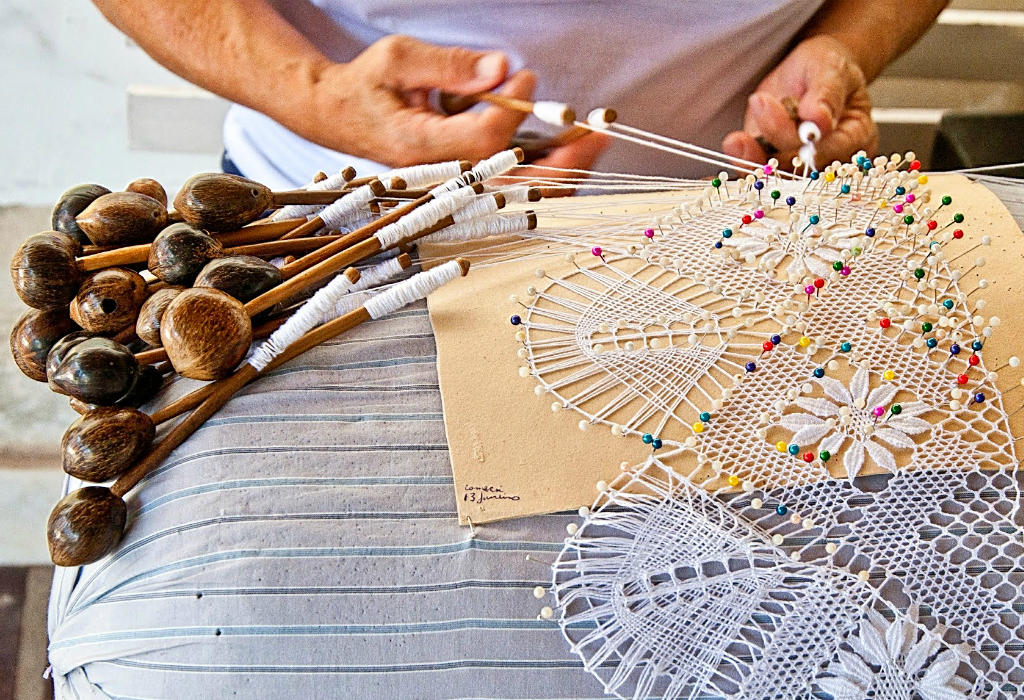 Dive into the intricate world of Portuguese bobbin laces, a centuries-old craft that embodies artistry, heritage, and the beauty of delicate lacework.
