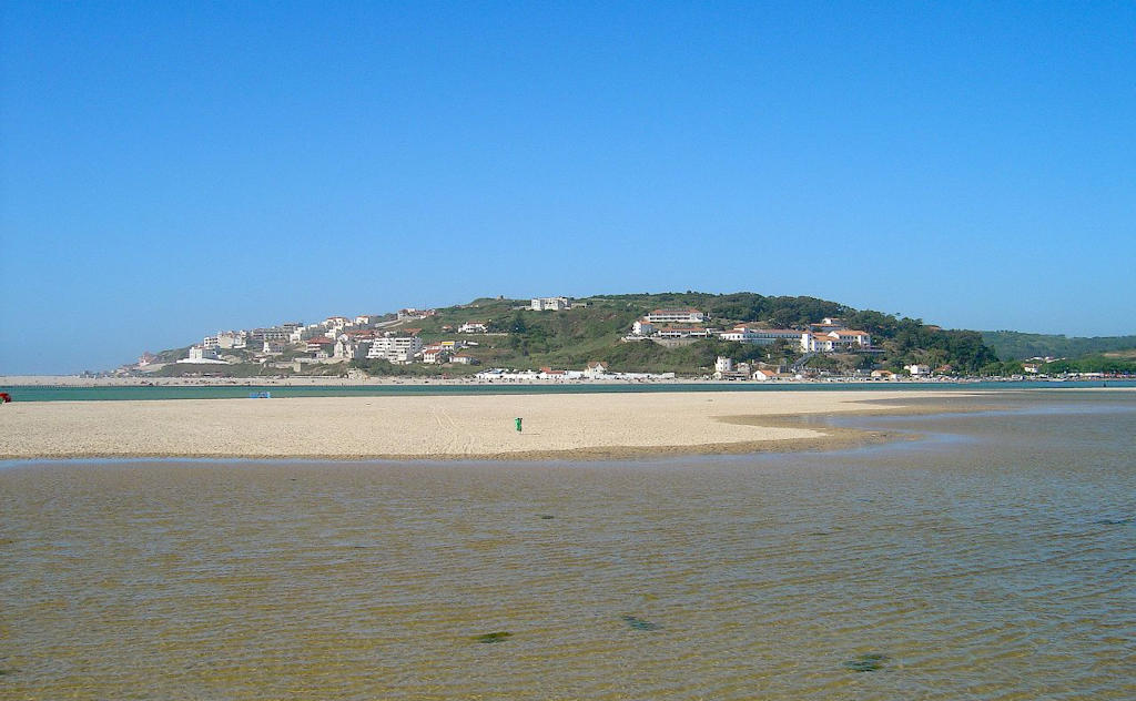 Escape to the serene coastal village of Foz do Arelho on Portugal's Silver Coast. Discover pristine beaches, a tranquil lagoon, and a charming village center. Perfect for a day trip from Lisbon.