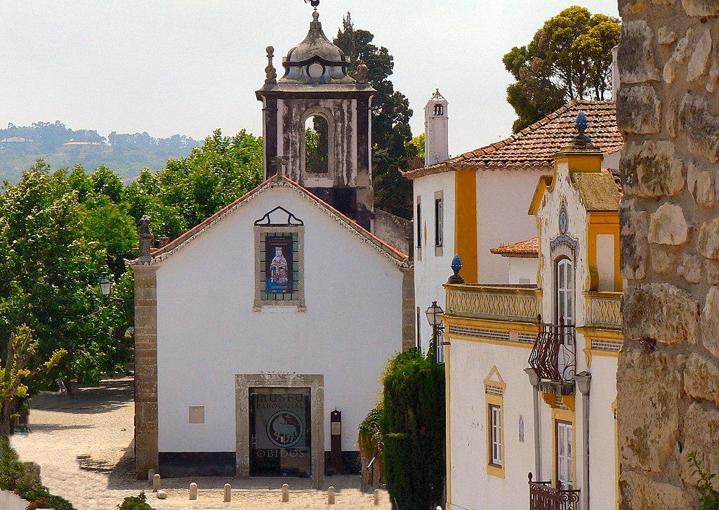 Experience the timeless allure of Saint John the Baptist Church, a captivating blend of history, faith, and architectural splendor in Óbidos, Portugal.