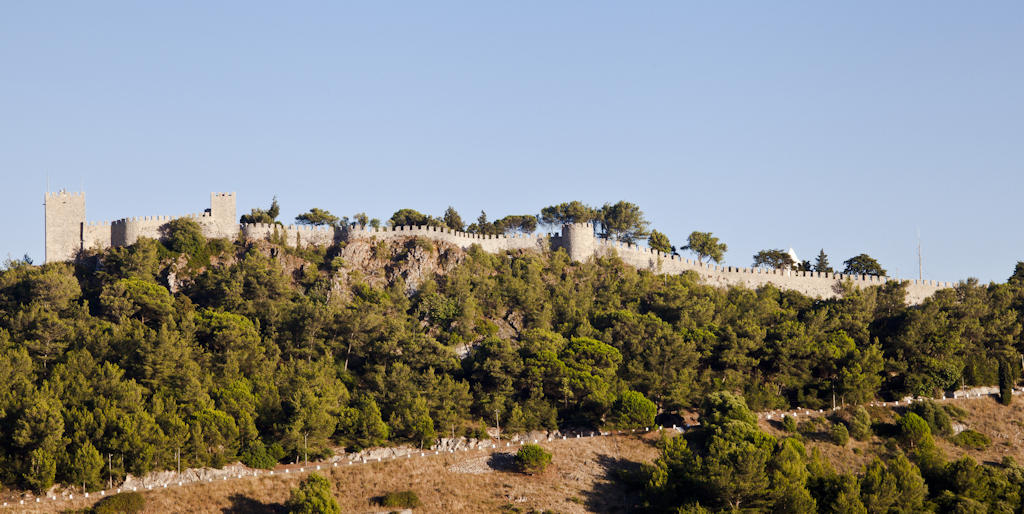 Explore Sesimbra Castle, an ancient fortress perched high above the coastal town, offering panoramic views and a glimpse into Portugal's rich history.