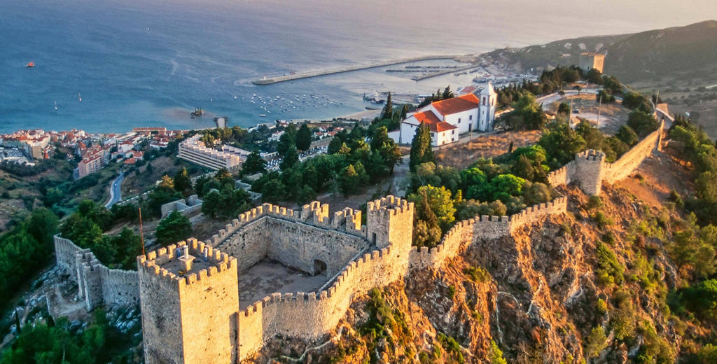 Sesimbra beckons with its picturesque beaches, ancient castle, and vibrant fishing port. Immerse yourself in its rich history, savor fresh seafood, and explore the natural wonders of this coastal gem in Portugal.