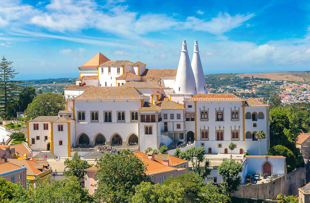 Step into the captivating world of Sintra National Palace, where Portugal's rich royal history is brought to life through opulent interiors and breathtaking gardens.