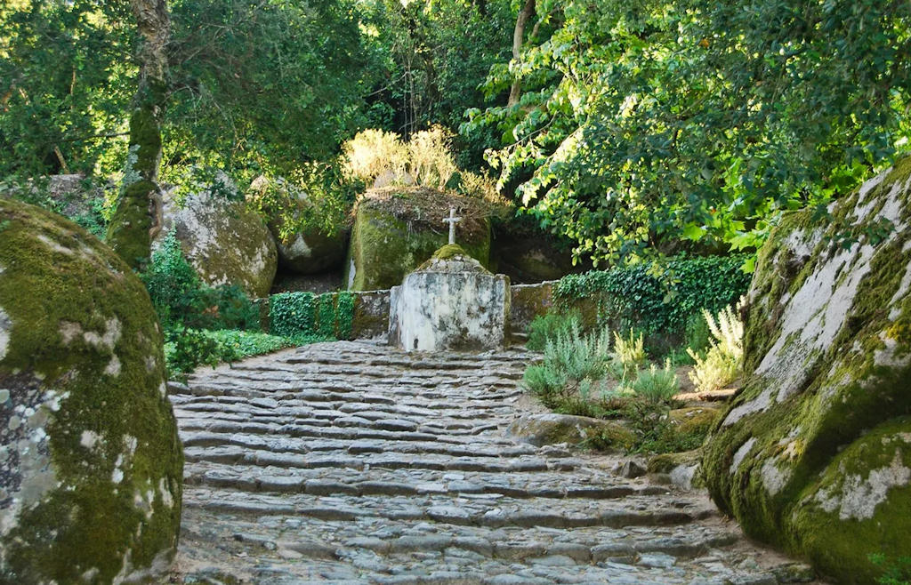 Step into tranquility at the Convent of the Capuchos, a humble retreat integrated with nature, revealing the spiritual essence of Portugal's Sintra Mountains.