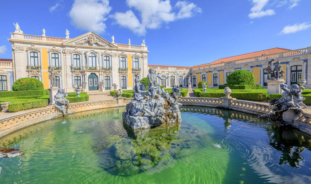 Uncover the allure of the Palace of Queluz, an architectural gem showcasing Rococo grandeur and the fascinating history of Portuguese royalty.