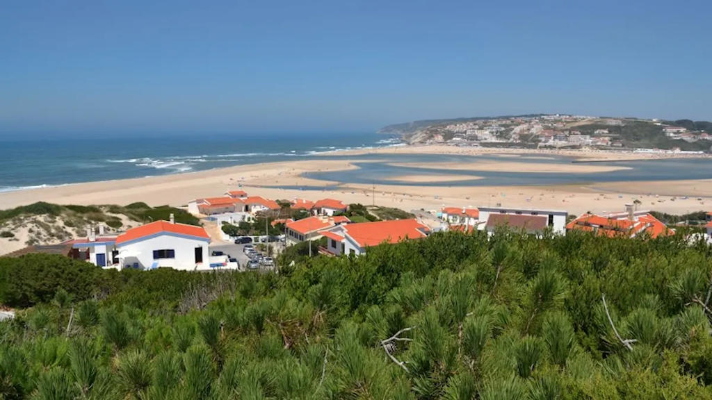 Experience the natural beauty and vibrant culture of Óbidos Lagoon in Portugal's Oeste region. Enjoy water sports, wildlife, and local charm.