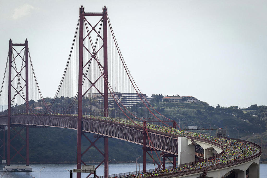 Unleash your inner athlete and experience the adrenaline of the EDP Lisbon Half Marathon, a renowned international race in Portugal's vibrant capital, boasting a record-permissible course and iconic landmarks.