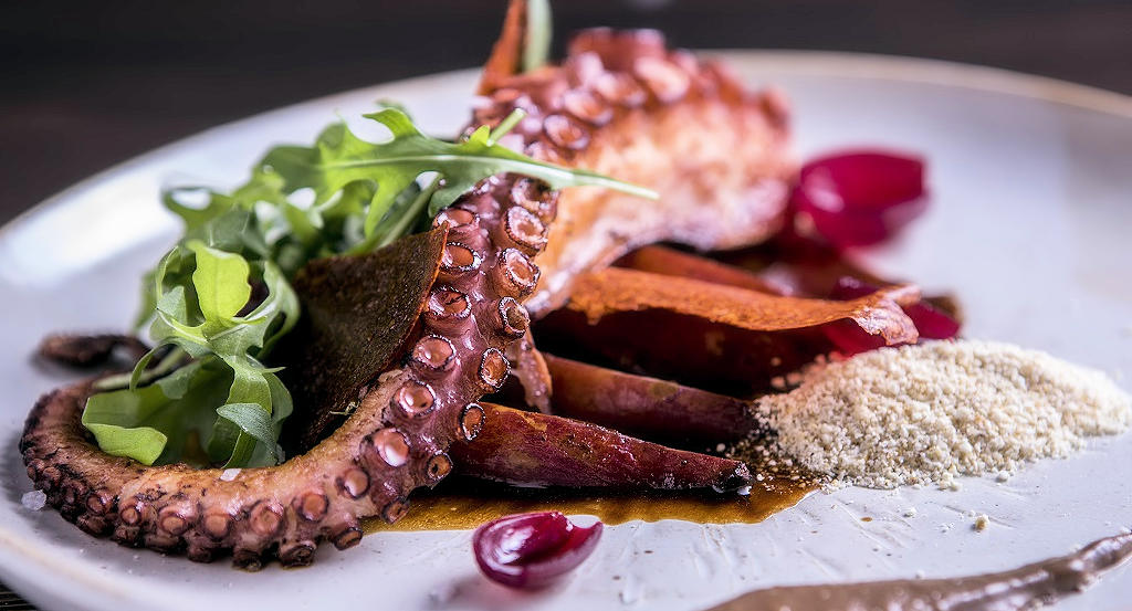 Polvo Grelhado: A celebration of Portuguese seafood and tradition, grilling succulent octopus to perfection while honoring the country's culinary heritage.