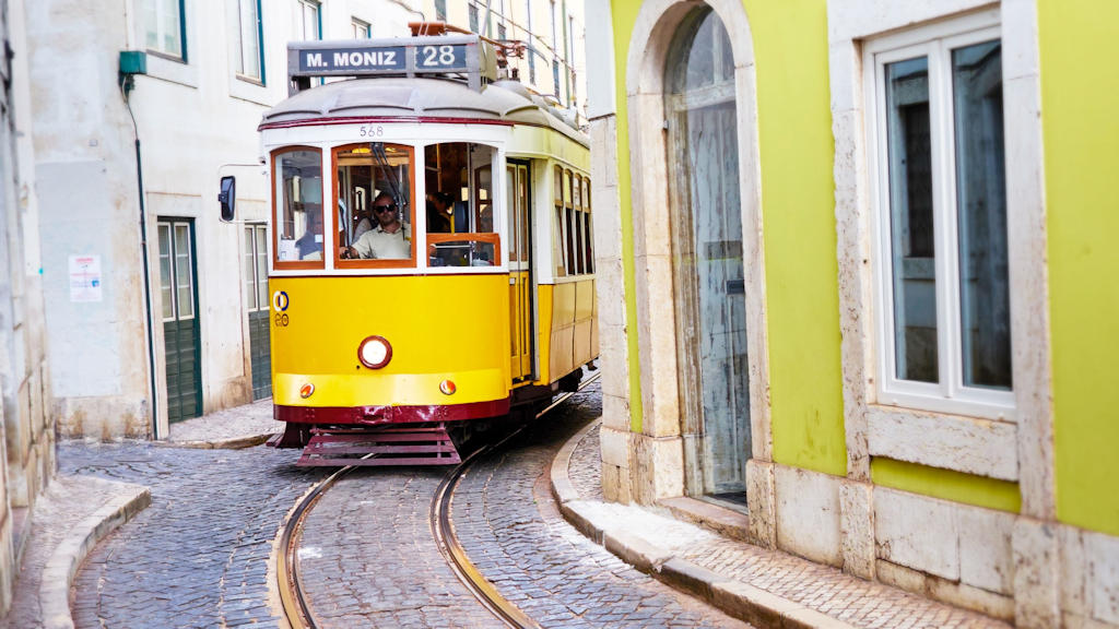 Step aboard Lisbon's Tram 28 and traverse the city's historic neighborhoods, iconic landmarks, and architectural wonders on a nostalgic journey.