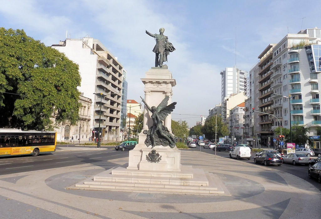 Praça do Duque de Saldanha in Lisbon beckons with its historic charm, bustling shops, and the statue of Marshal Saldanha—a vibrant hub that captures the essence of the city.