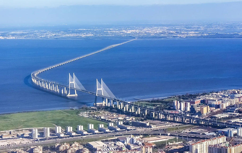 Discover Lisbon's iconic Vasco da Gama Bridge, a remarkable engineering marvel offering breathtaking views of the Tagus River.