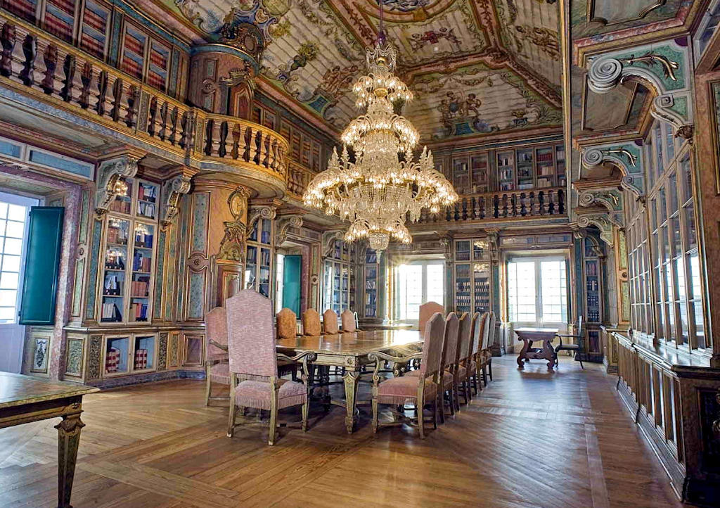 Immerse yourself in the architectural splendor and humanitarian knowledge of the Library of the Portuguese Red Cross at Palácio dos Condes d'Óbidos, Lisbon.