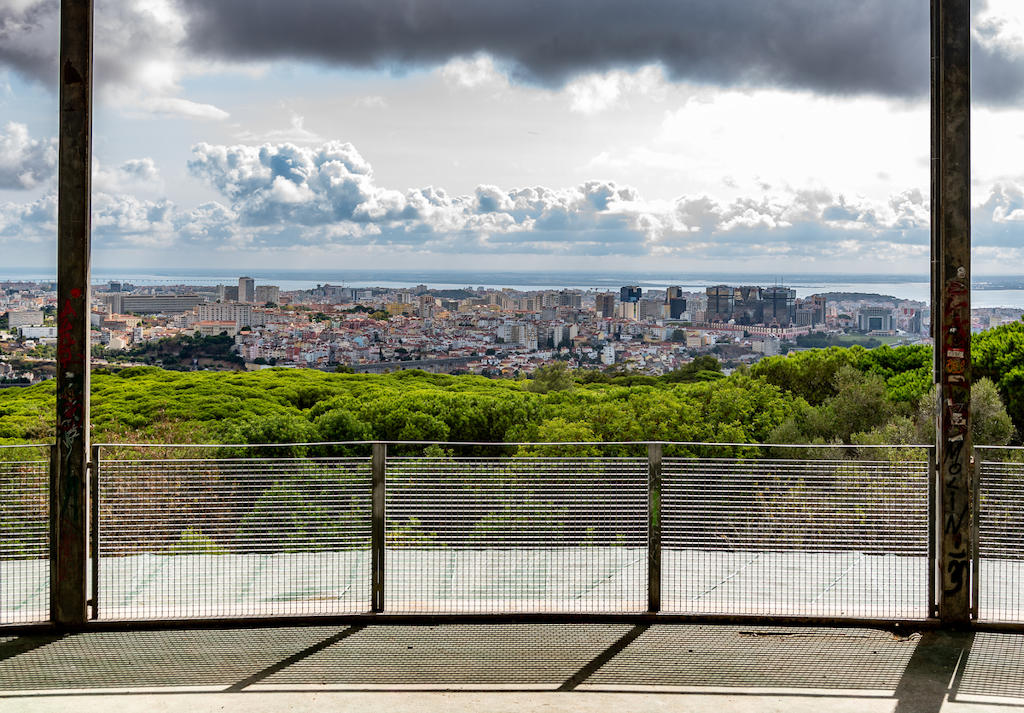 Experience the wonders of Torre de Observação do CIM, a captivating nature sanctuary and viewpoint nestled in Parque Florestal de Monsanto, offering breathtaking views of Lisbon's landscape.