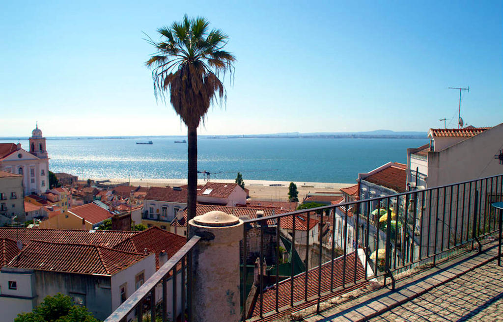 Witness the captivating vistas and architectural beauty of Miradouro das Portas do Sol—an iconic viewpoint in Lisbon's Alfama district that embraces the city's vibrant heritage and scenic allure.