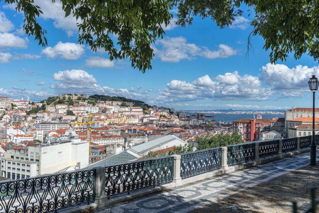 Miradouro de São Pedro de Alcântara in Lisbon offers panoramic views, serene gardens, and a vibrant district, creating a captivating escape in the heart of the city.