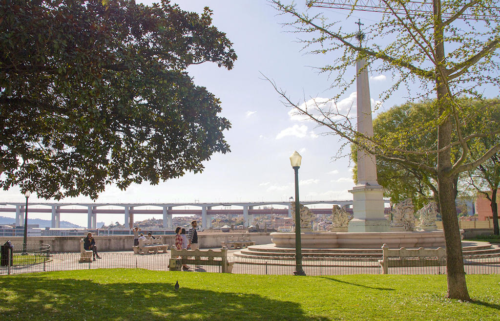 Escape to Miradouro do Largo das Necessidades, a serene oasis offering captivating views and lush gardens, in Lisbon's Estrela neighborhood.